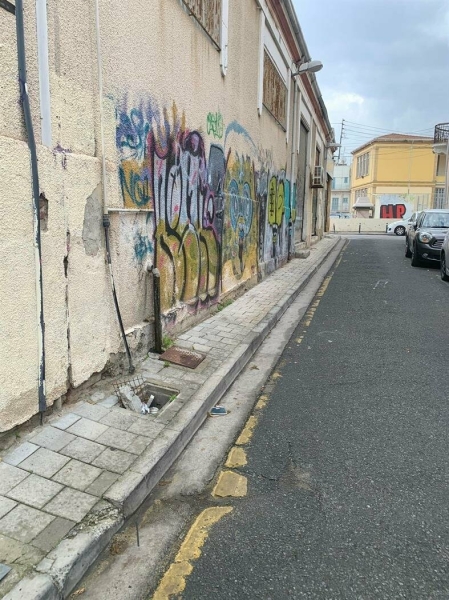 Настенные надписи на старых зданиях — проблема для муниципалитета Никосии